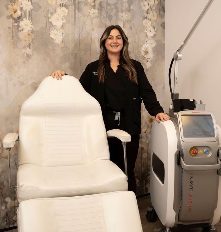 Aesthetic treatment room with Avon med spa practitioner and equipment.