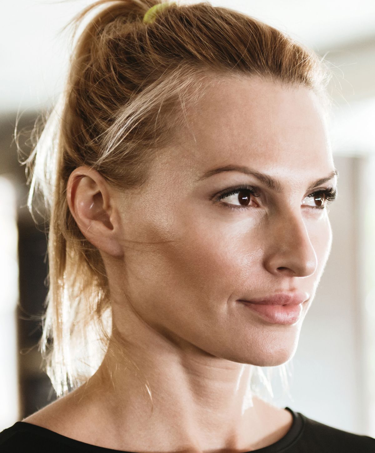 Profile of Farmington Botox model with blonde hair.