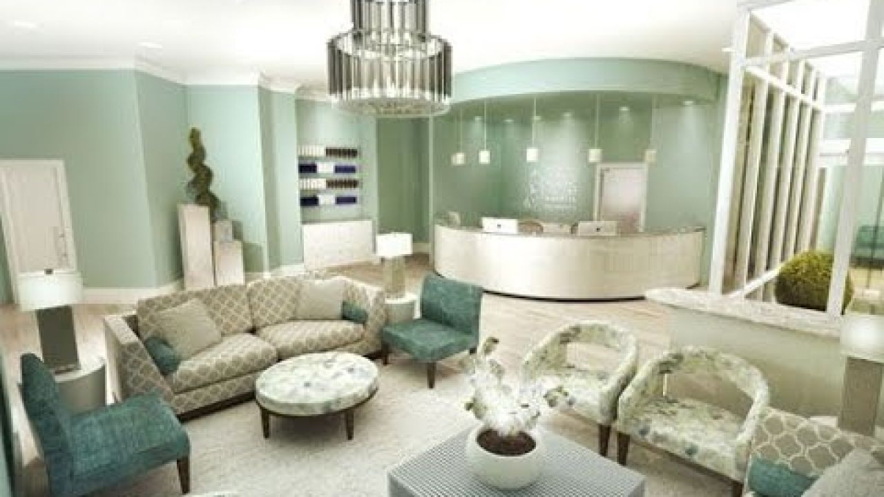 Modern reception area with stylish seating, at Youthful Images - Avon's premier plastic surgery center.