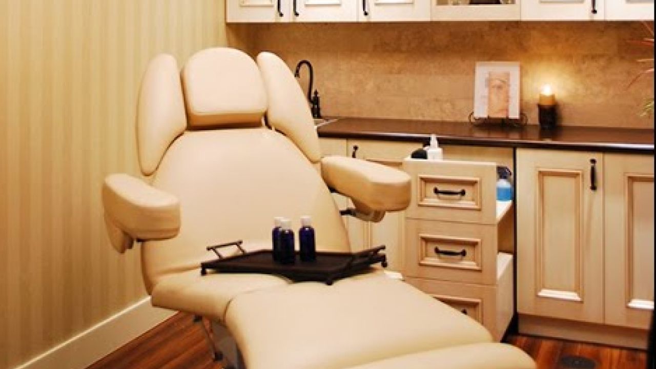 Avon med spa treatment room with a reclining chair, at Youthful Images.